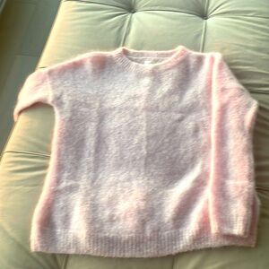 Pink wool sweater by the French brand Des Petits Hauts.